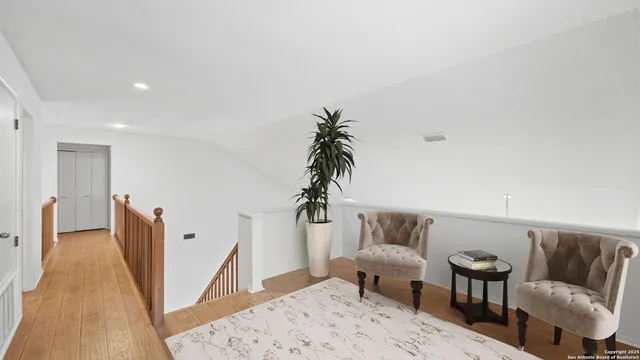 a living room with furniture and a couch