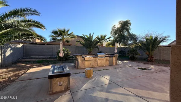a house with palm tree in front of it