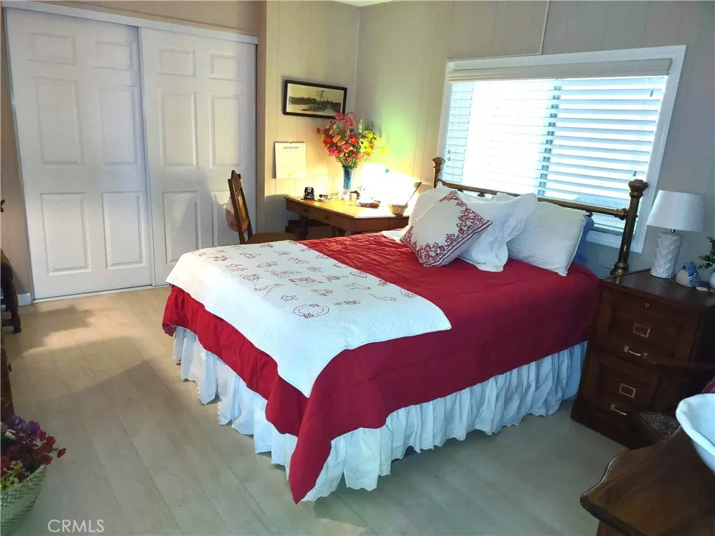 554 Beach Needles Ca Needles, CA 92363 - Photo 17 of 31 a bedroom with a bed and window