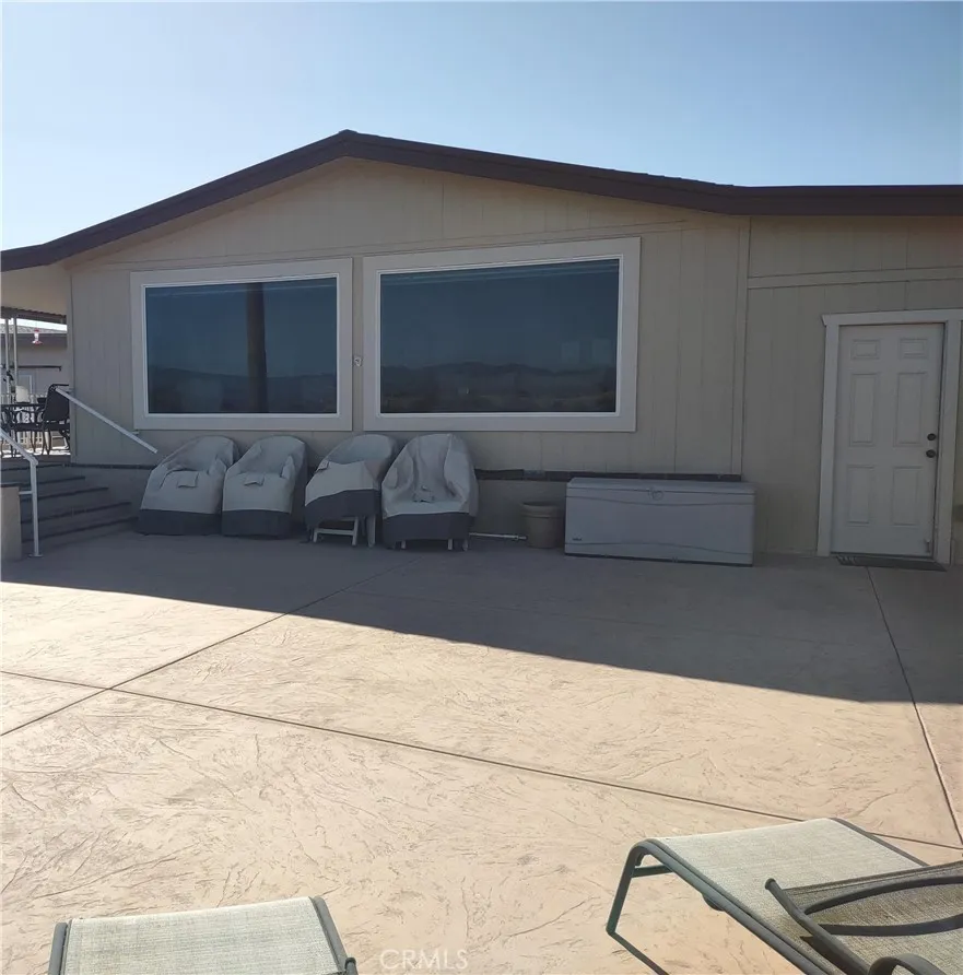 554 Beach Needles Ca Needles, CA 92363 - Photo 22 of 31 a living room with a couch and a stove