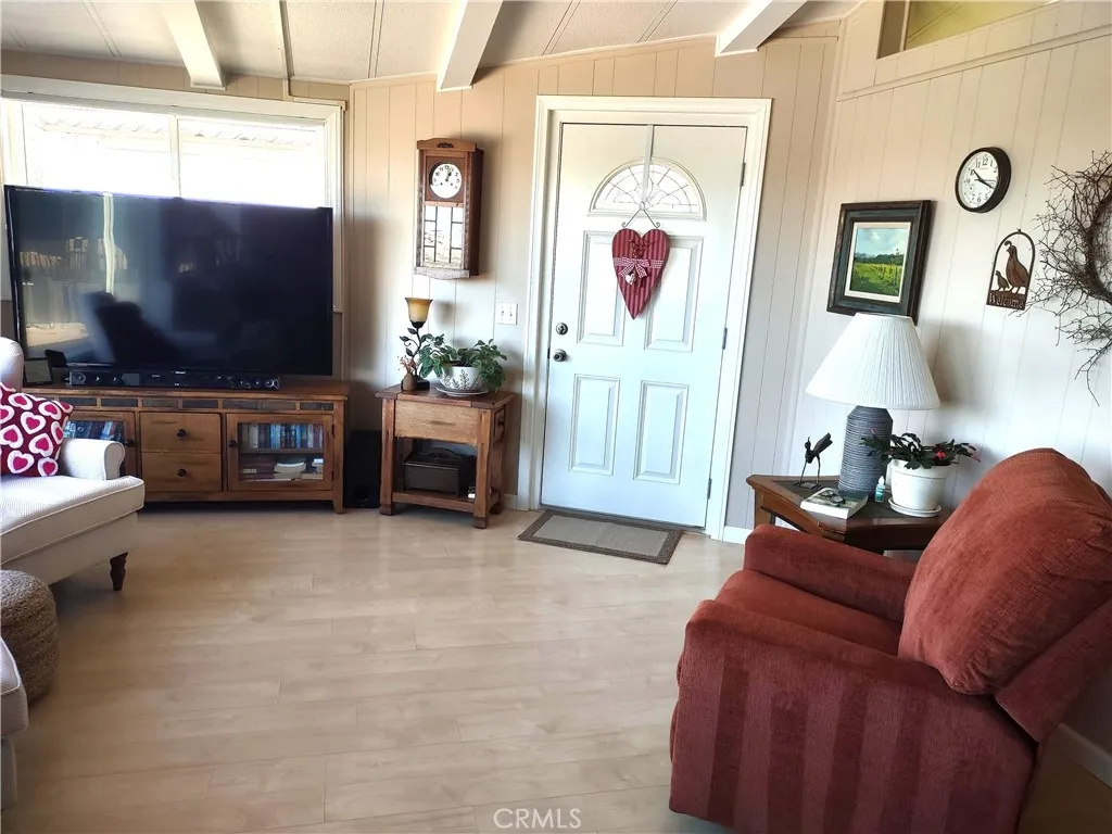 554 Beach Needles Ca Needles, CA 92363 - Photo 5 of 31 a living room with furniture and a flat screen tv