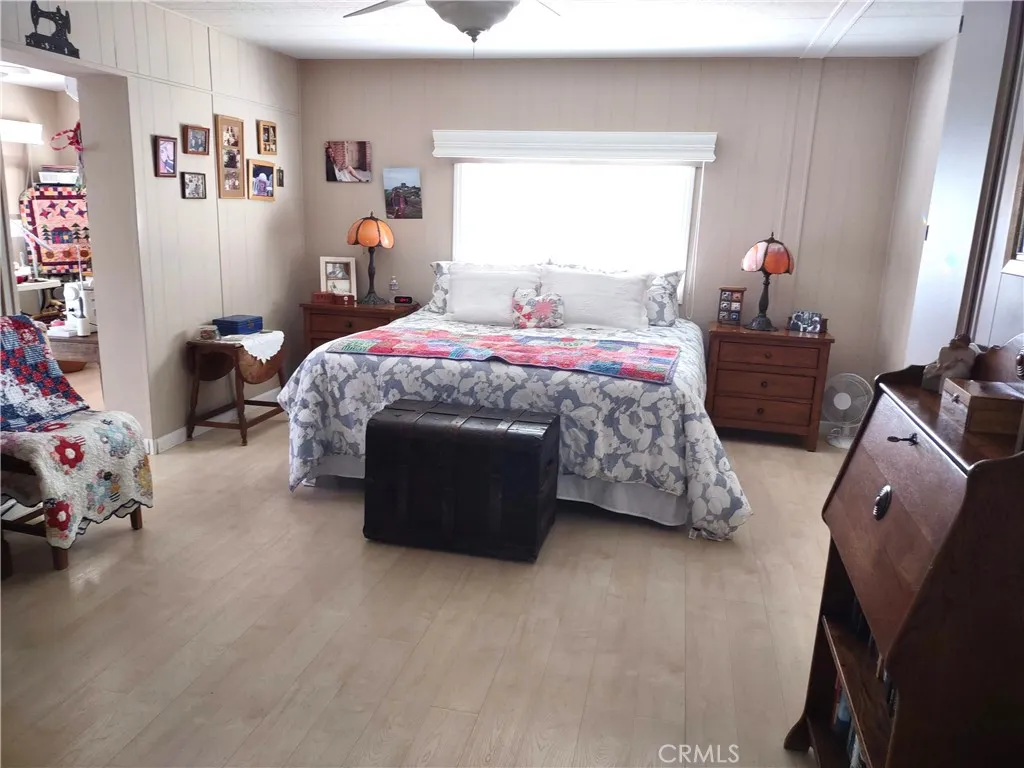 554 Beach Needles Ca Needles, CA 92363 - Photo 10 of 31 a bed room with a bed and a couch