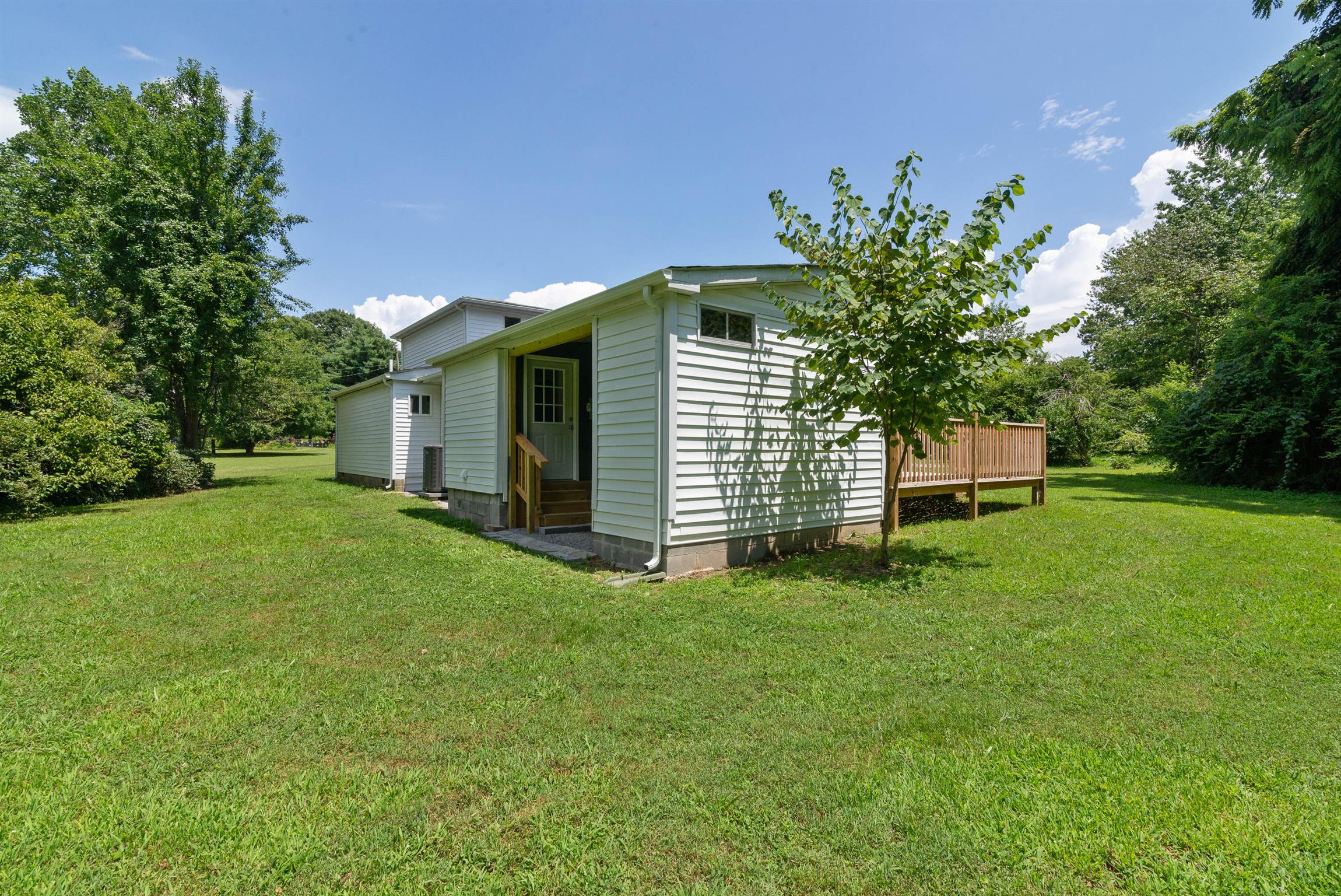 456 Boiling Springs Road Portland, TN 37148 - Photo 28 of 28 a front view of a house with a garden