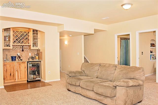 654 Struthers Ranch Road Colorado Springs, CO 80921 - Photo 20 of 35 newly finished basement with granite wet bar!
