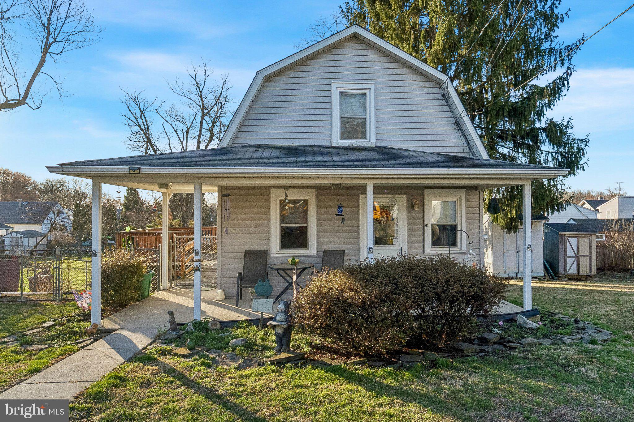 Charming home with inviting porch.