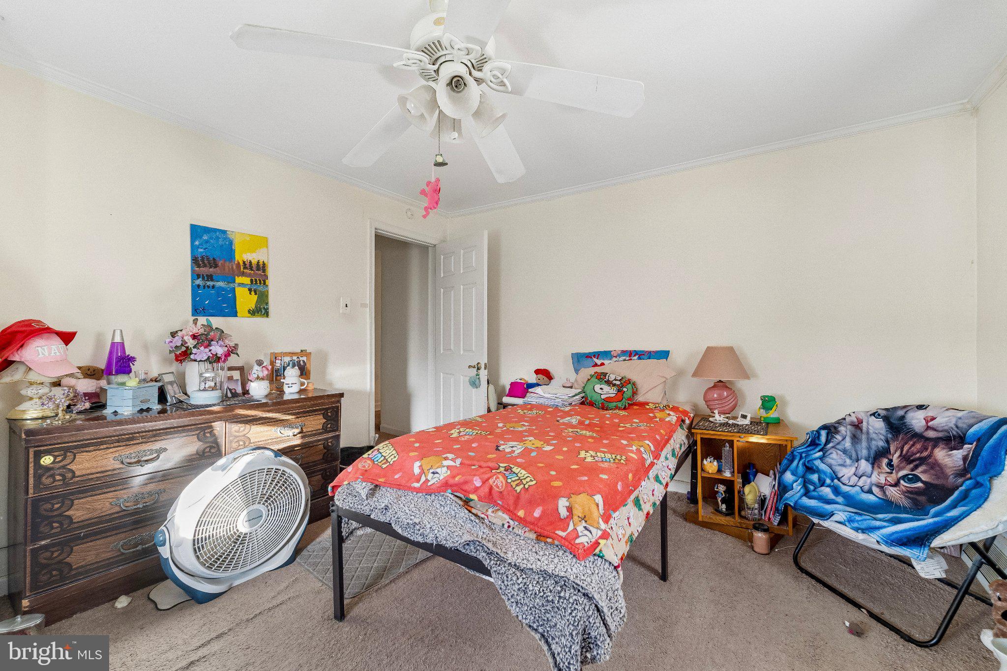 309 Dutton Mill Road Brookhaven, PA 19015 - Photo 11 of 24 Cozy bedroom with vibrant decor.