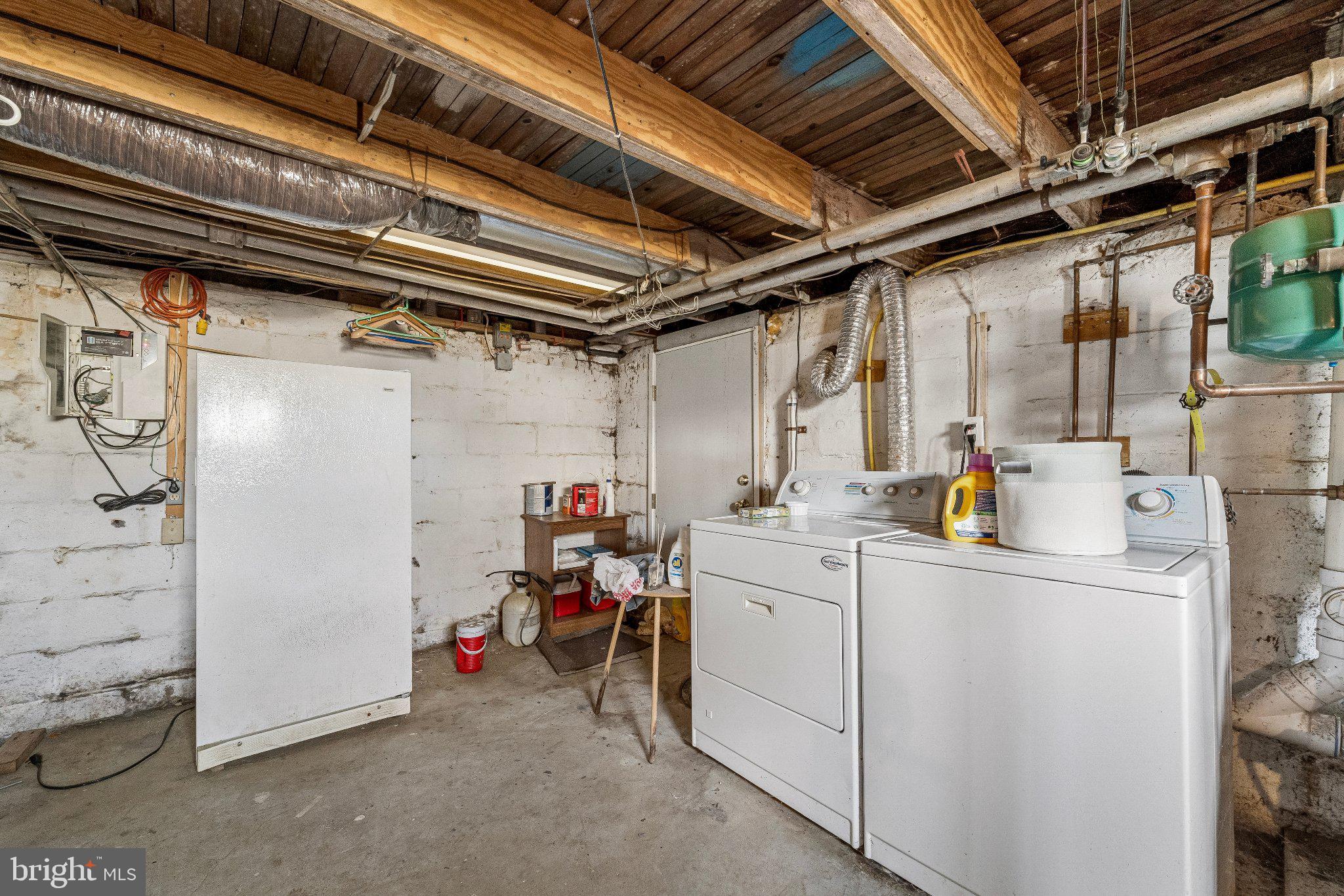 309 Dutton Mill Road Brookhaven, PA 19015 - Photo 15 of 24 Functional laundry space with charm.