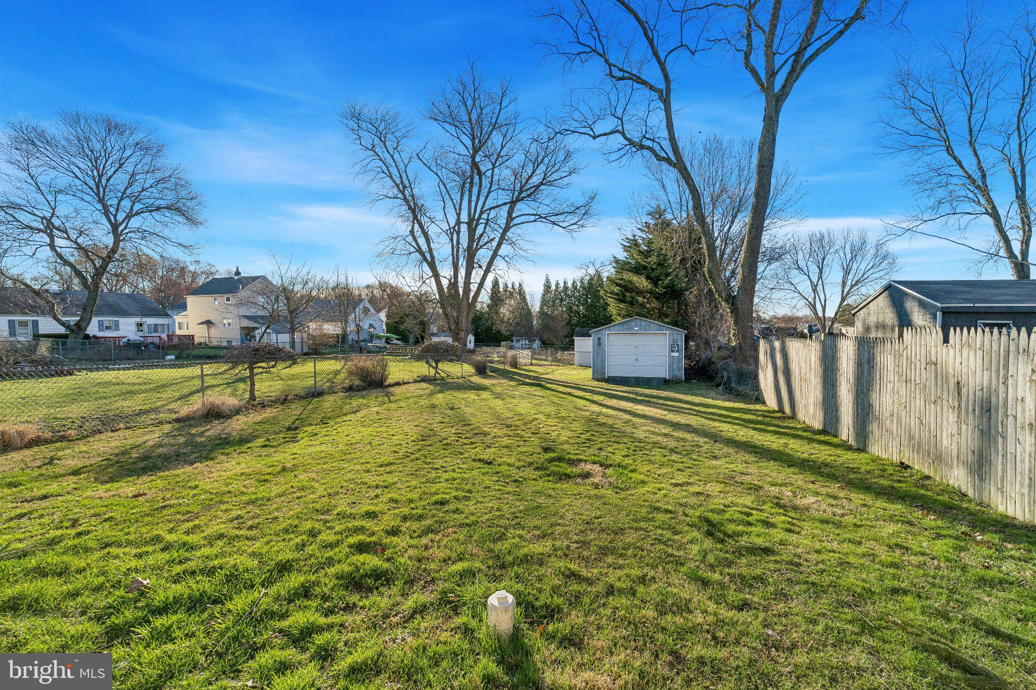 309 Dutton Mill Road Brookhaven, PA 19015 - Photo 17 of 24 Spacious yard with serene views.