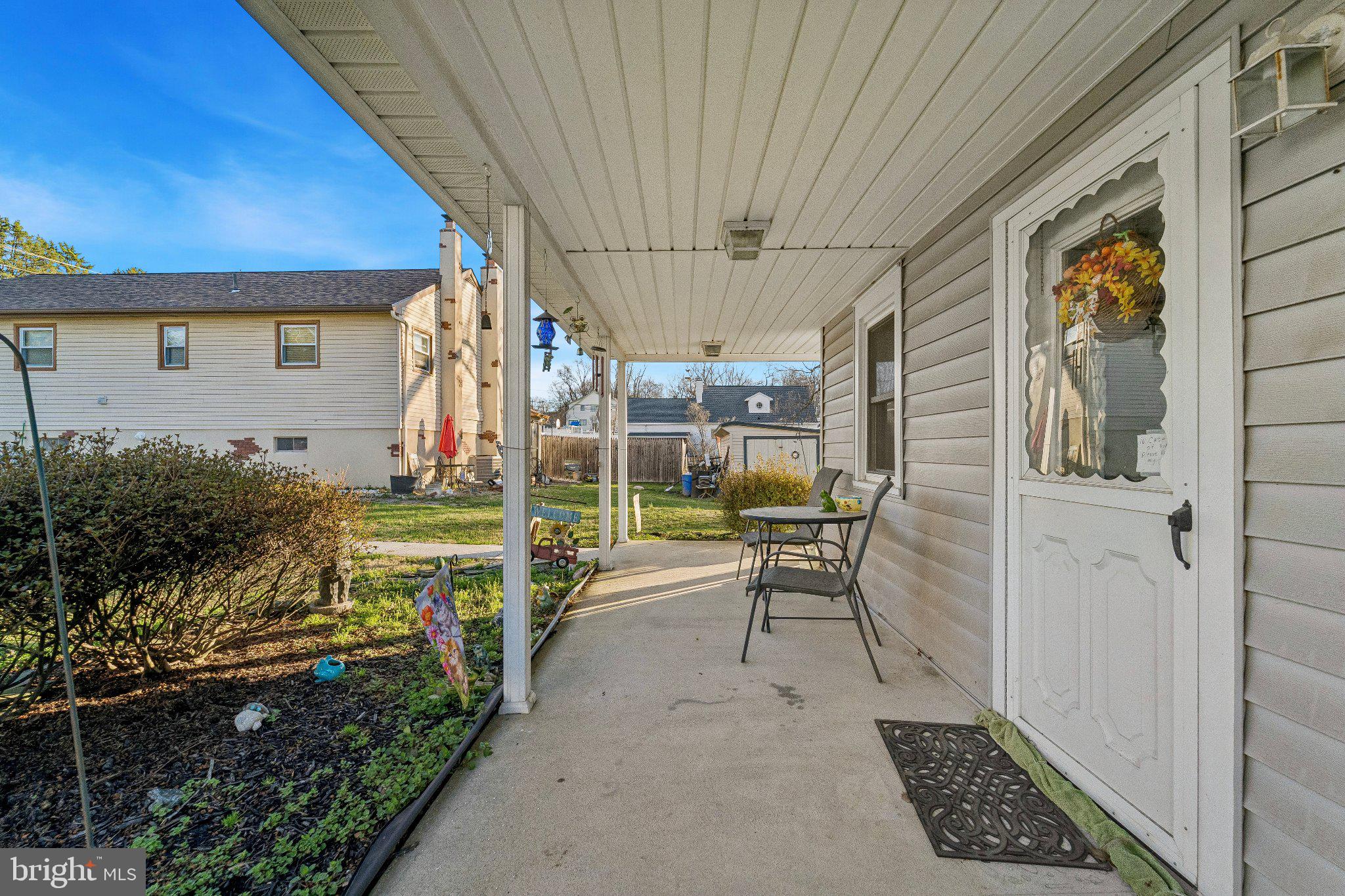 309 Dutton Mill Road Brookhaven, PA 19015 - Photo 2 of 24 Charming porch with inviting views.