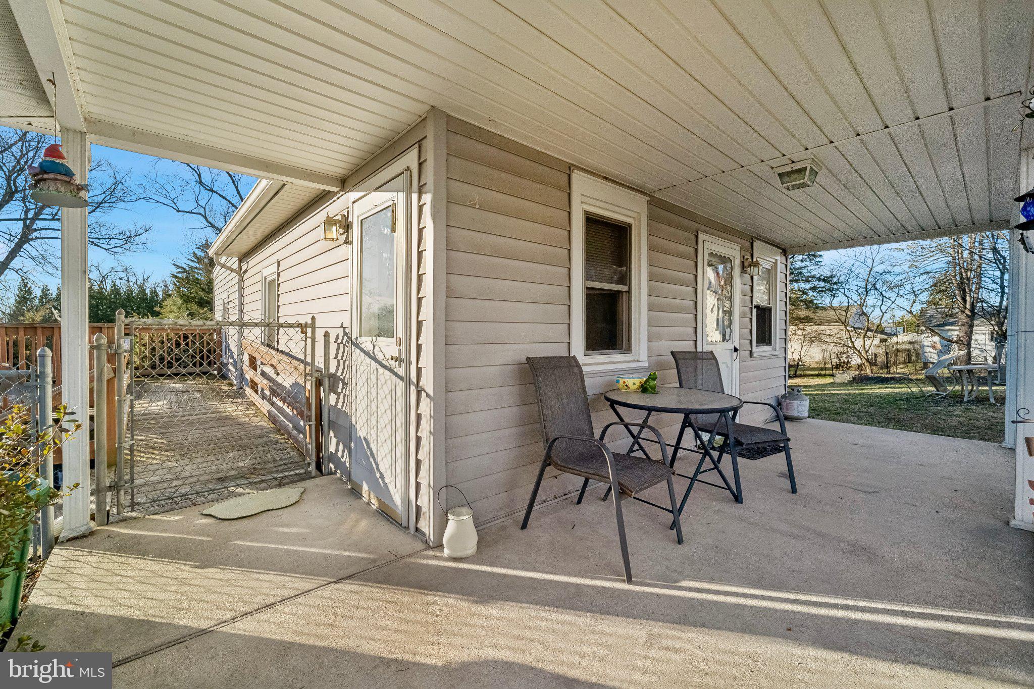 309 Dutton Mill Road Brookhaven, PA 19015 - Photo 3 of 24 Charming patio for outdoor relaxation.