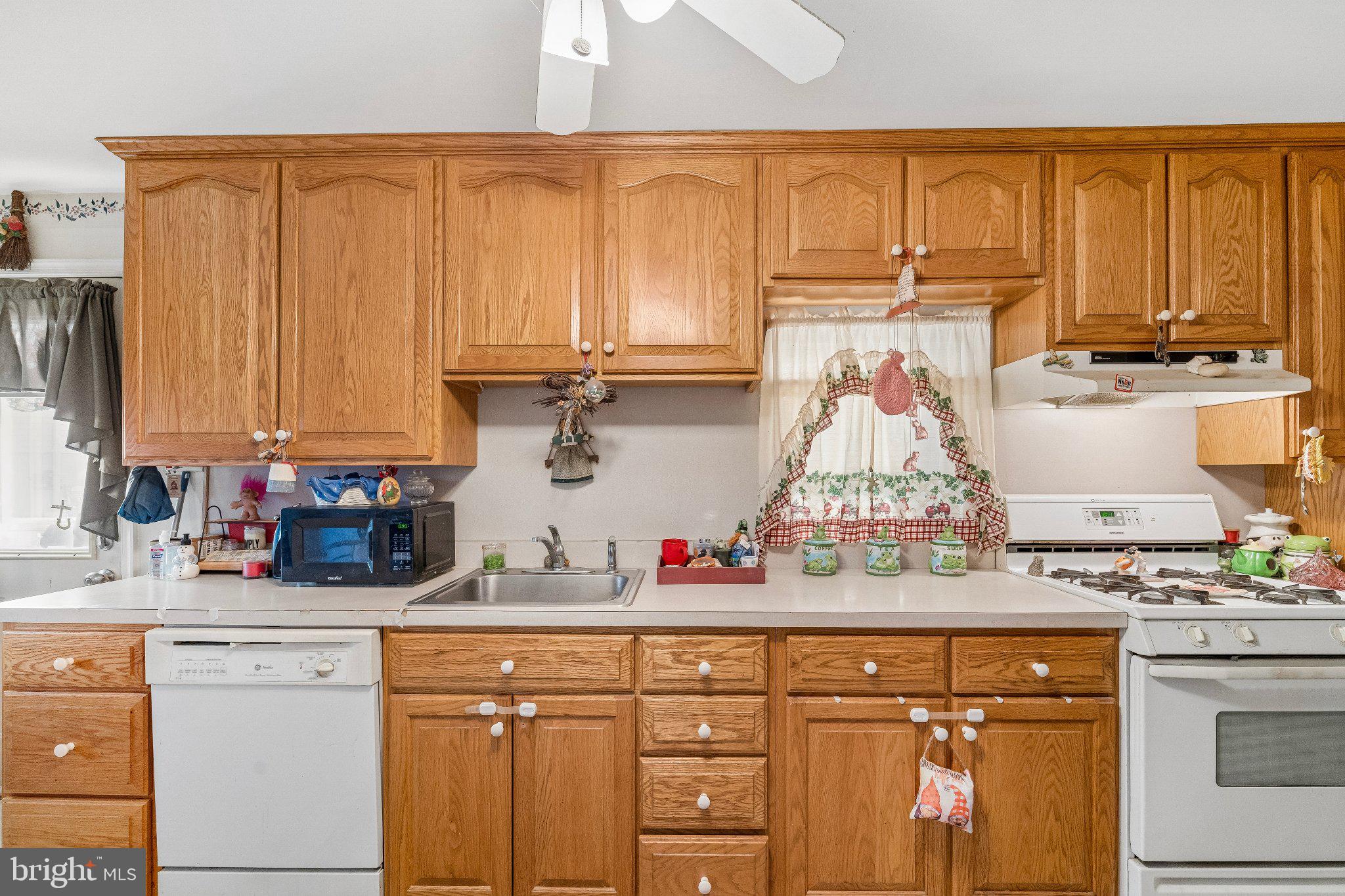 309 Dutton Mill Road Brookhaven, PA 19015 - Photo 5 of 24 Warm oak kitchen with charming details.