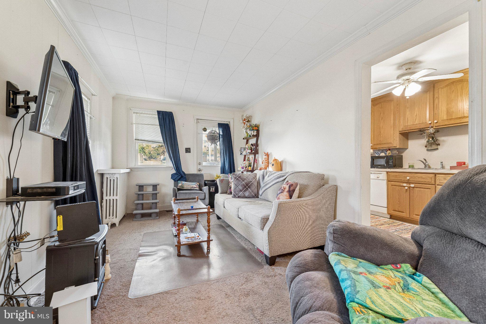 309 Dutton Mill Road Brookhaven, PA 19015 - Photo 7 of 24 Cozy living space with natural light.