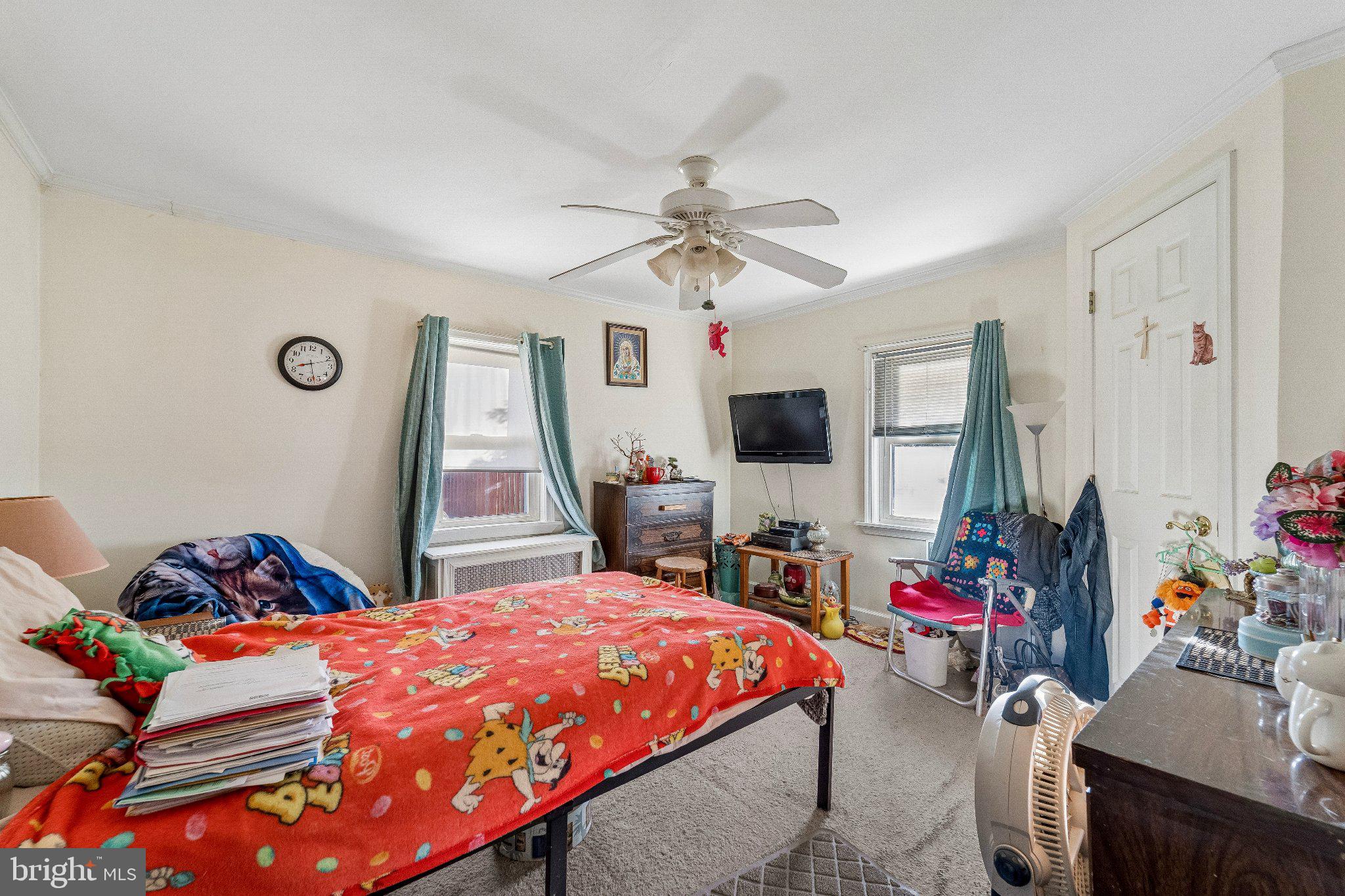 309 Dutton Mill Road Brookhaven, PA 19015 - Photo 10 of 24 Cozy bedroom with vibrant decor.