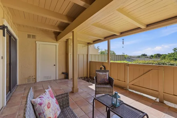 a balcony with hardwood