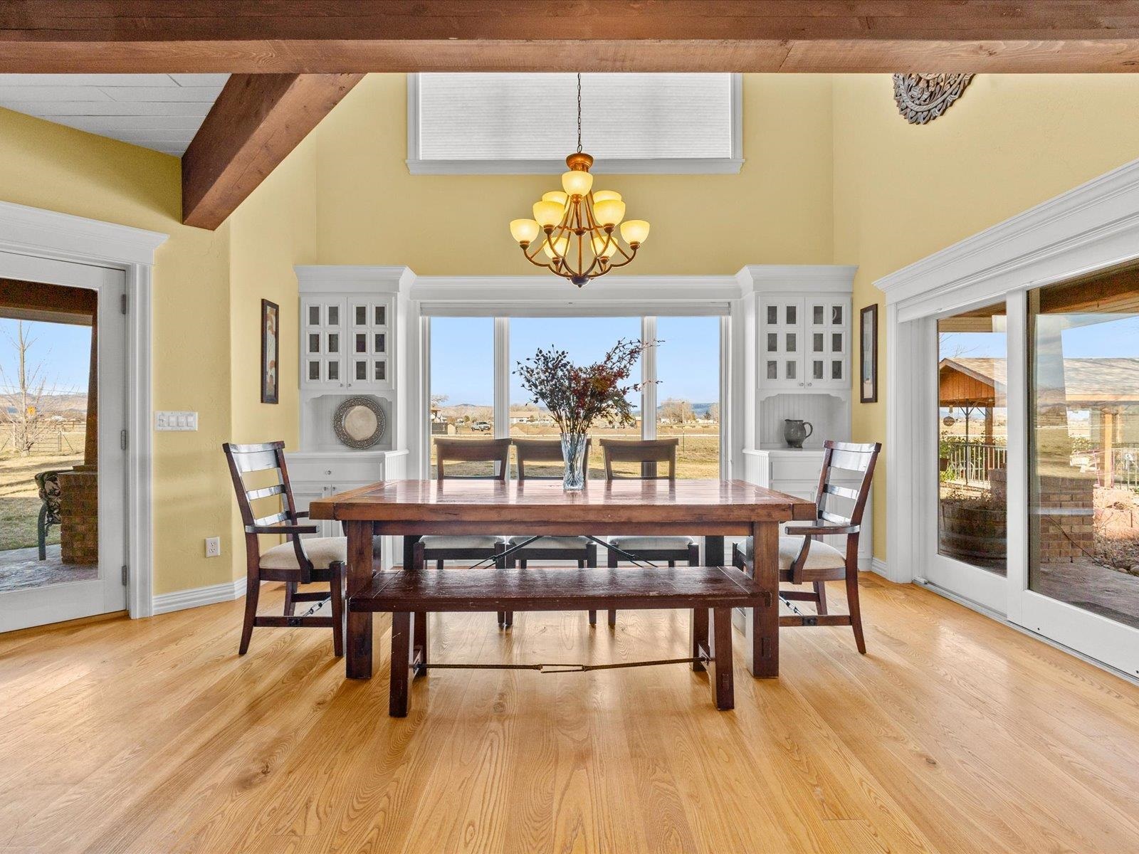 1891 J J 6/10 Road Fruita, CO 81521 - Photo 12 of 41 a view of a dining room with furniture and wooden floor