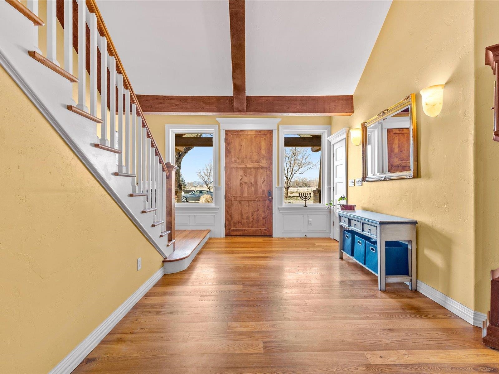 1891 J J 6/10 Road Fruita, CO 81521 - Photo 4 of 41 a view of an entryway with wooden floor and a livingroom
