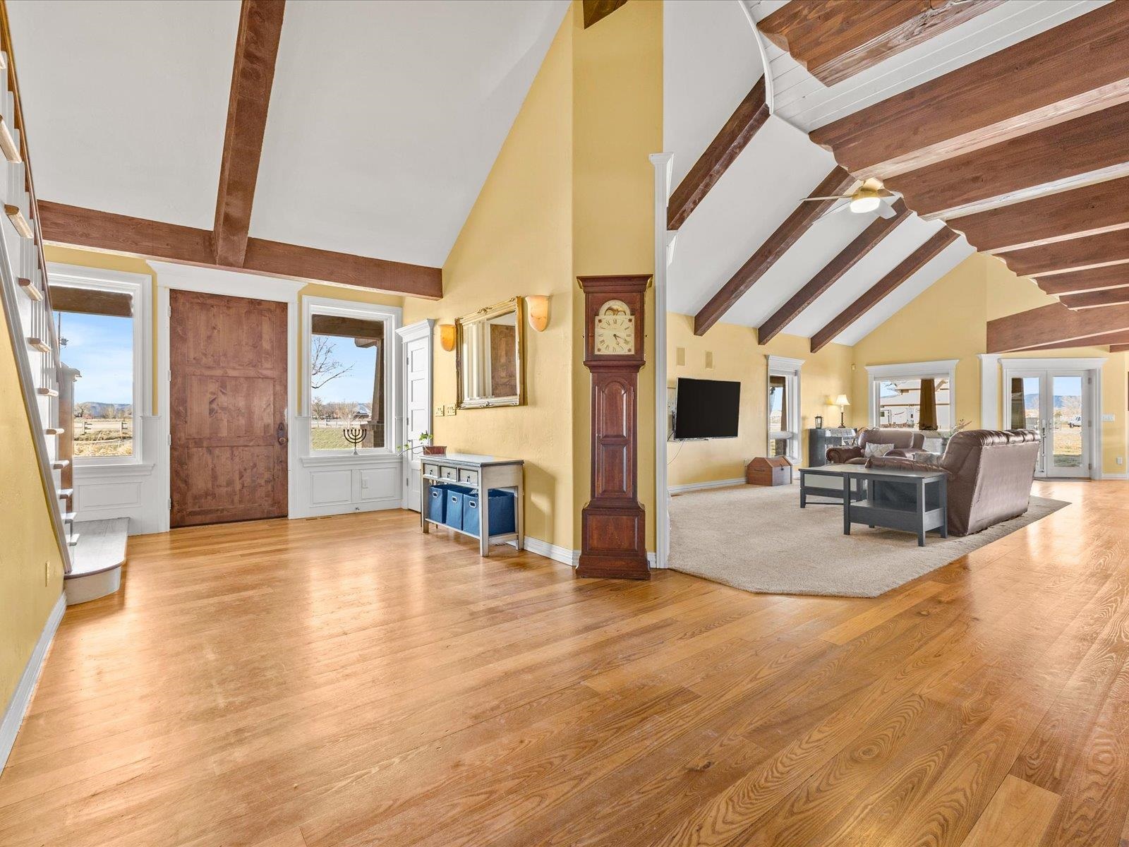 1891 J J 6/10 Road Fruita, CO 81521 - Photo 6 of 41 a view of a livingroom with furniture wooden floor and windows