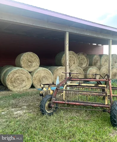 a view of a house with a yard and entertaining space