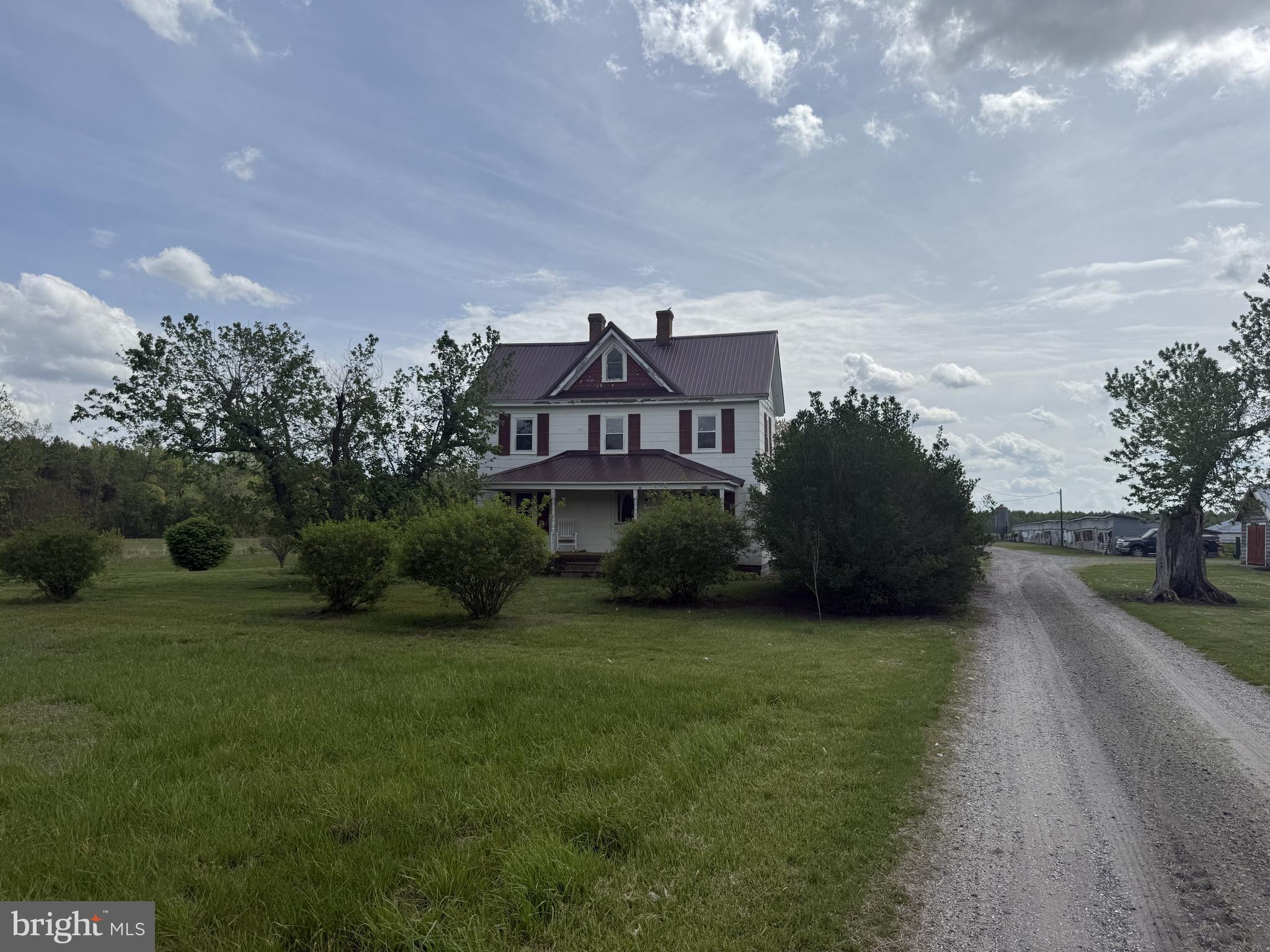 36555 Sheppards Crossing Road Willards, MD 21874 - Photo 23 of 47 a view of a big house with a big yard and large trees