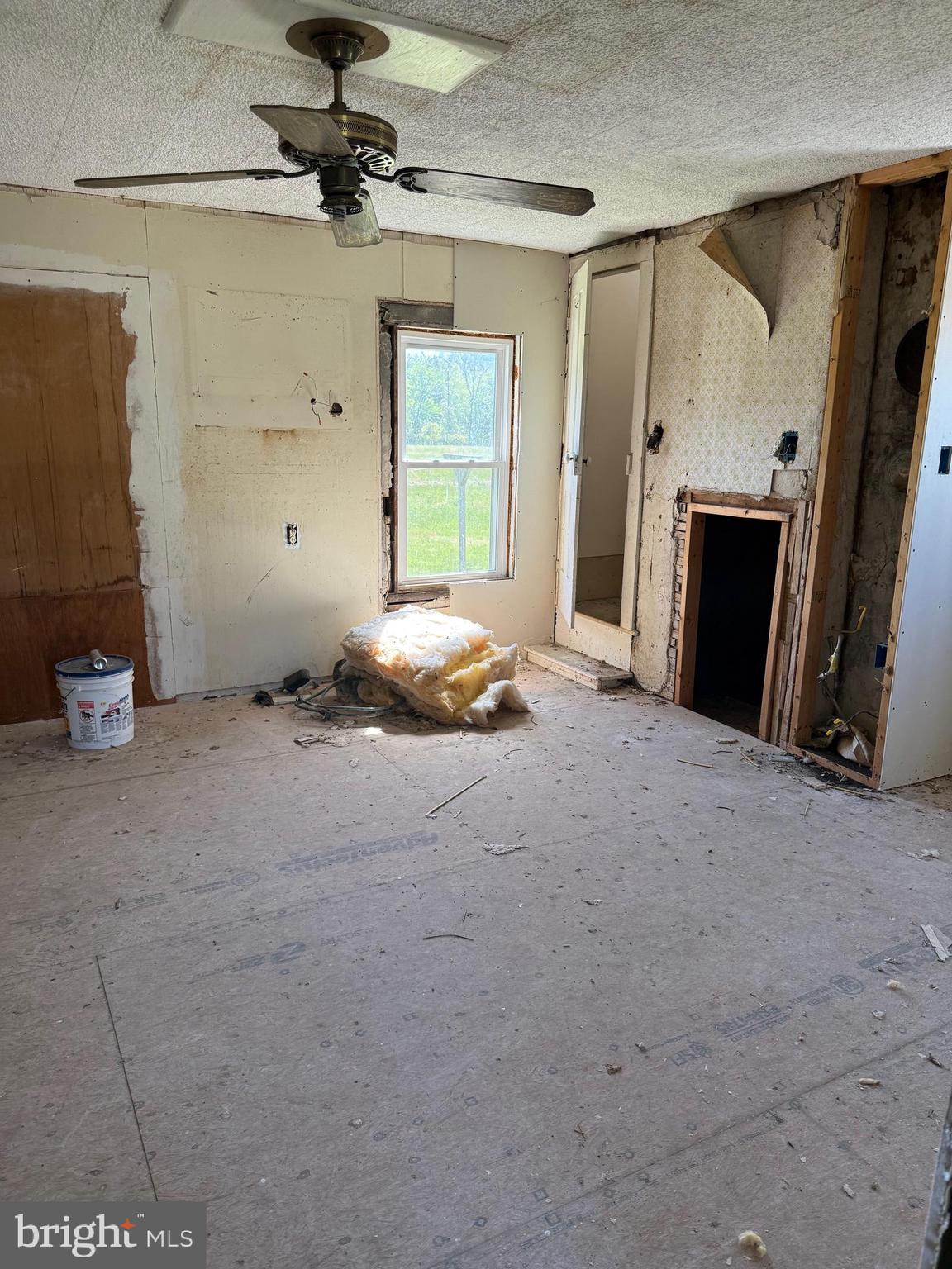 36555 Sheppards Crossing Road Willards, MD 21874 - Photo 33 of 47 a view of a livingroom with furniture and a ceiling fan