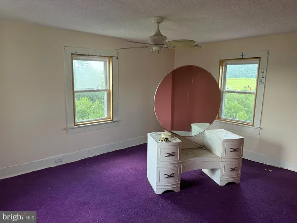 a room with a sink and a window