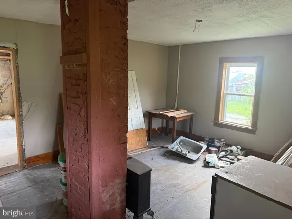 a room with furniture and a window