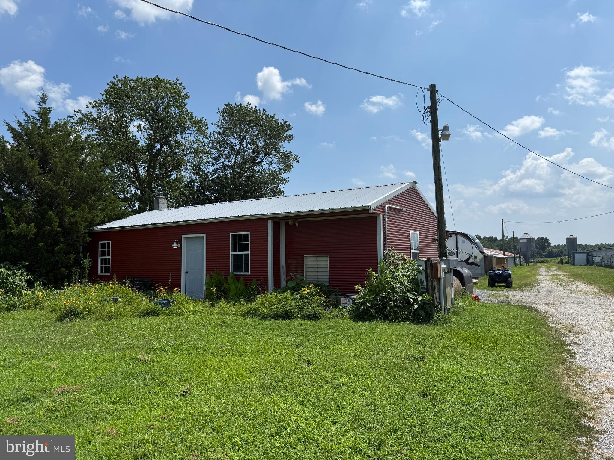 36555 Sheppards Crossing Road Willards, MD 21874 - Photo 44 of 47 a view of a house with backyard and garden