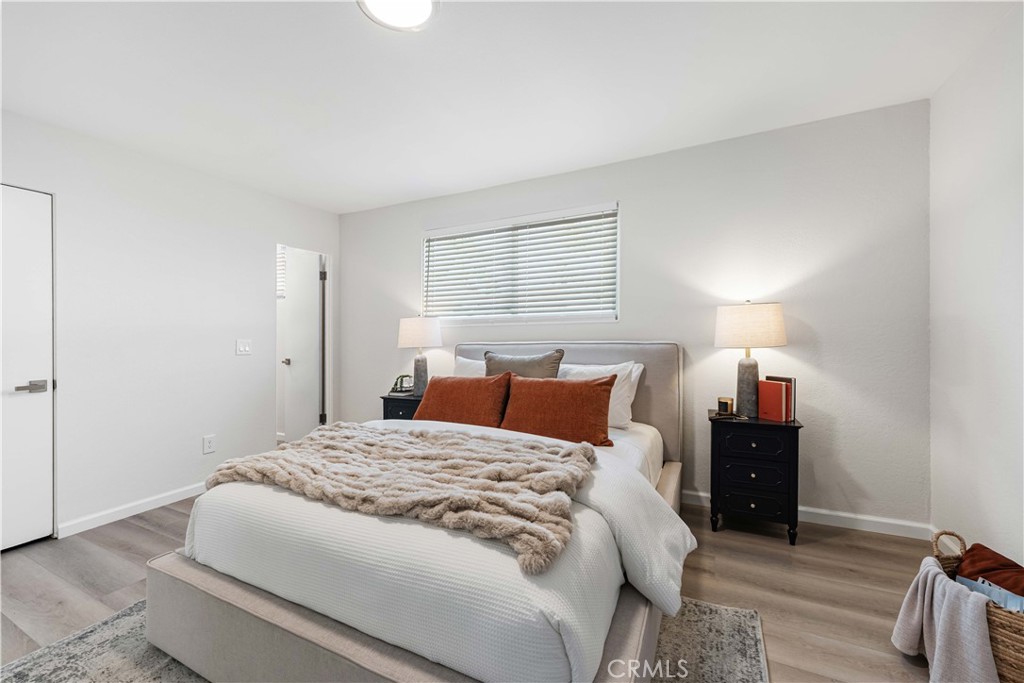 727 North Burney Street Rialto, CA 92376 - Photo 16 of 40 a bed room with a bed and closet