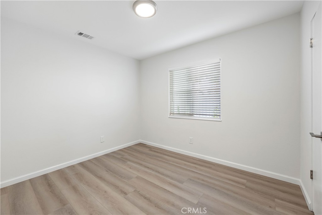 727 North Burney Street Rialto, CA 92376 - Photo 21 of 40 wooden floor in an empty room