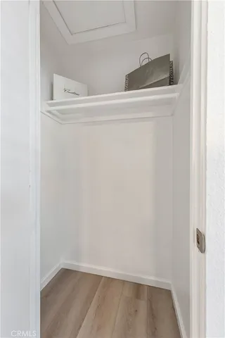 a view of a patio with a table chairs and a backyard