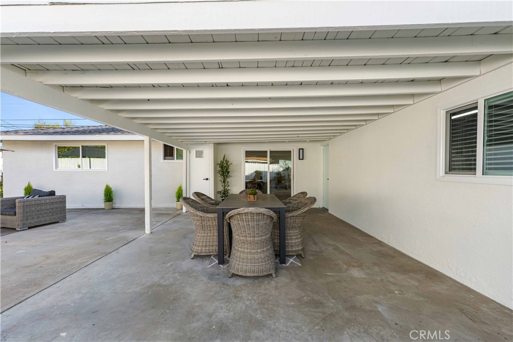 727 North Burney Street Rialto, CA 92376 - Photo 26 of 40 a living room with furniture and a potted plant