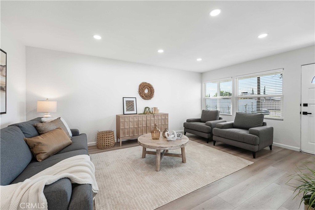 727 North Burney Street Rialto, CA 92376 - Photo 8 of 40 a living room with furniture and a large window