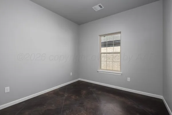 a view of a hallway with closet