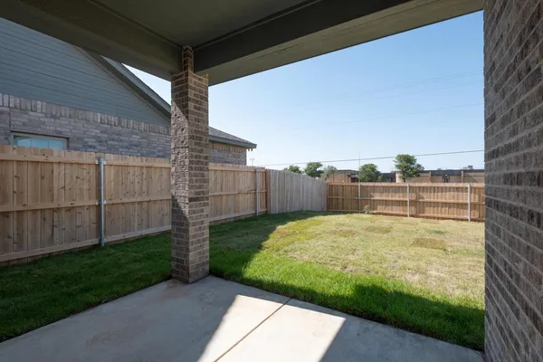 a brick building with a large window