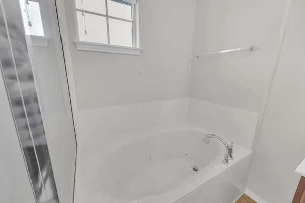 a close view of a bathtub in bathroom