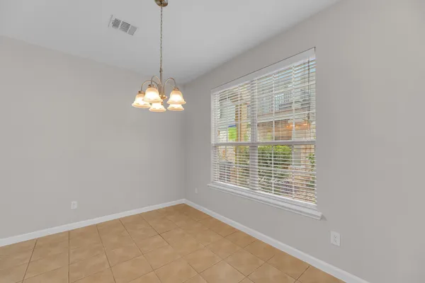 a view of a room with windows