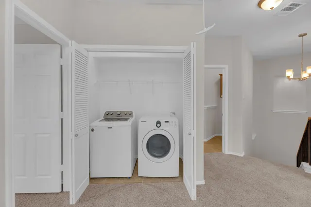 a storage room with washer and dryer