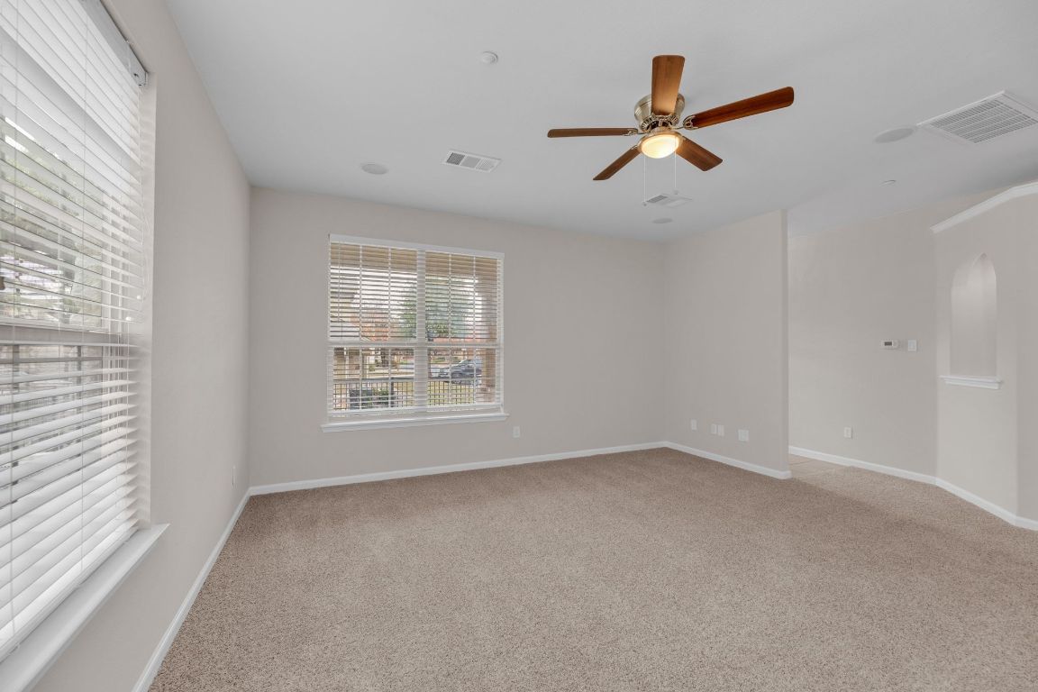 14815 Avery Ranch Boulevard, Unit 403/4B Austin, TX 78717 - Photo 5 of 38 a view of an empty room with a window