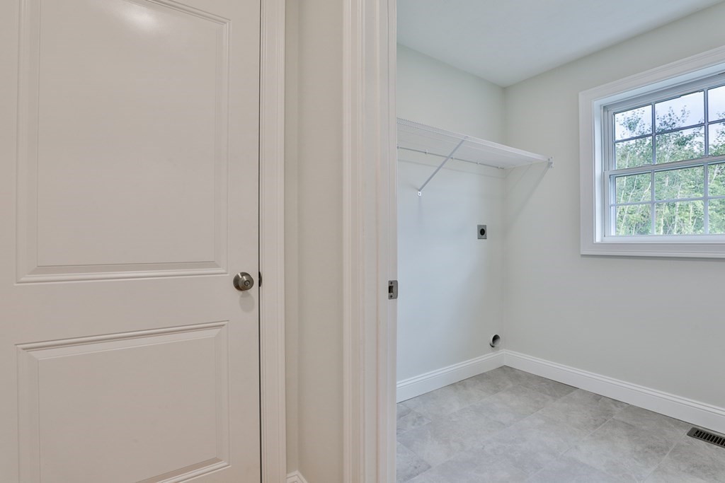492 Northfield Road Lunenburg, MA 01462 - Photo 11 of 39 a view of an empty room with a window