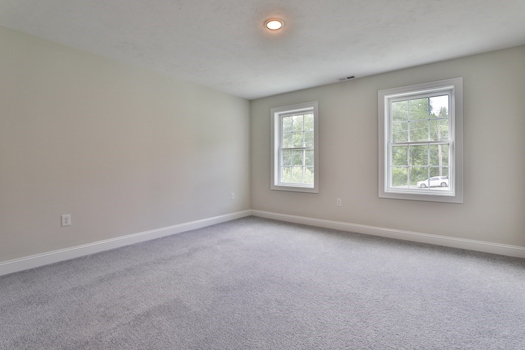 492 Northfield Road Lunenburg, MA 01462 - Photo 17 of 39 an empty room with windows