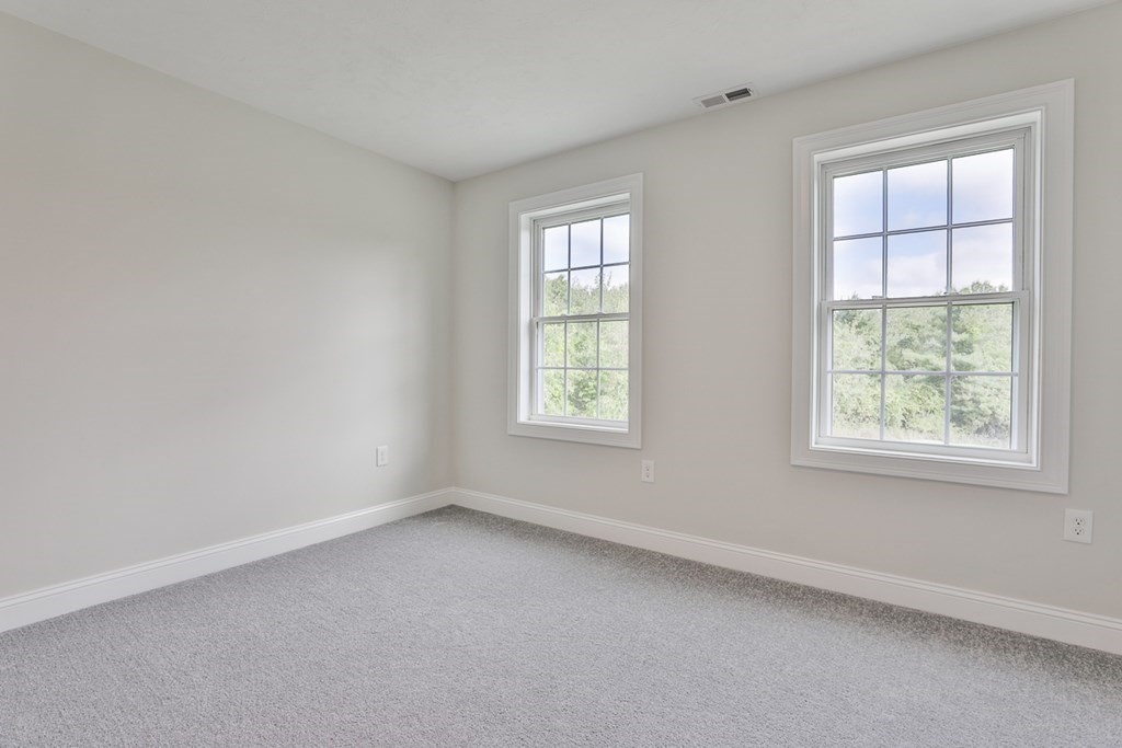492 Northfield Road Lunenburg, MA 01462 - Photo 21 of 39 an empty room with a window