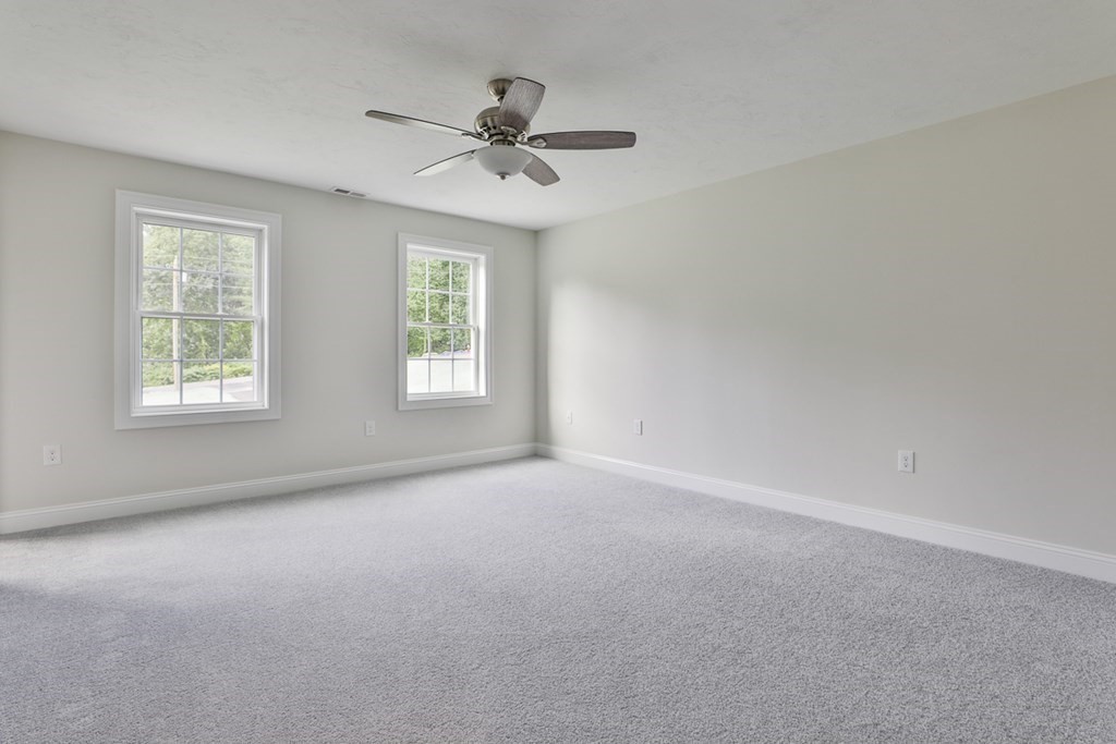 492 Northfield Road Lunenburg, MA 01462 - Photo 23 of 39 a view of an empty room with a window