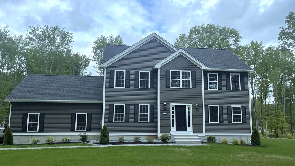 492 Northfield Road Lunenburg, MA 01462 - Photo 34 of 39 front view of a house with a yard