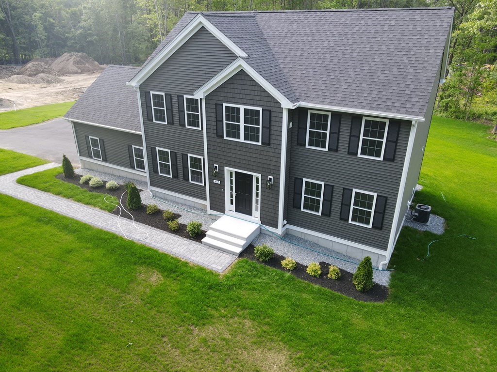 492 Northfield Road Lunenburg, MA 01462 - Photo 37 of 39 a front view of a house with a yard