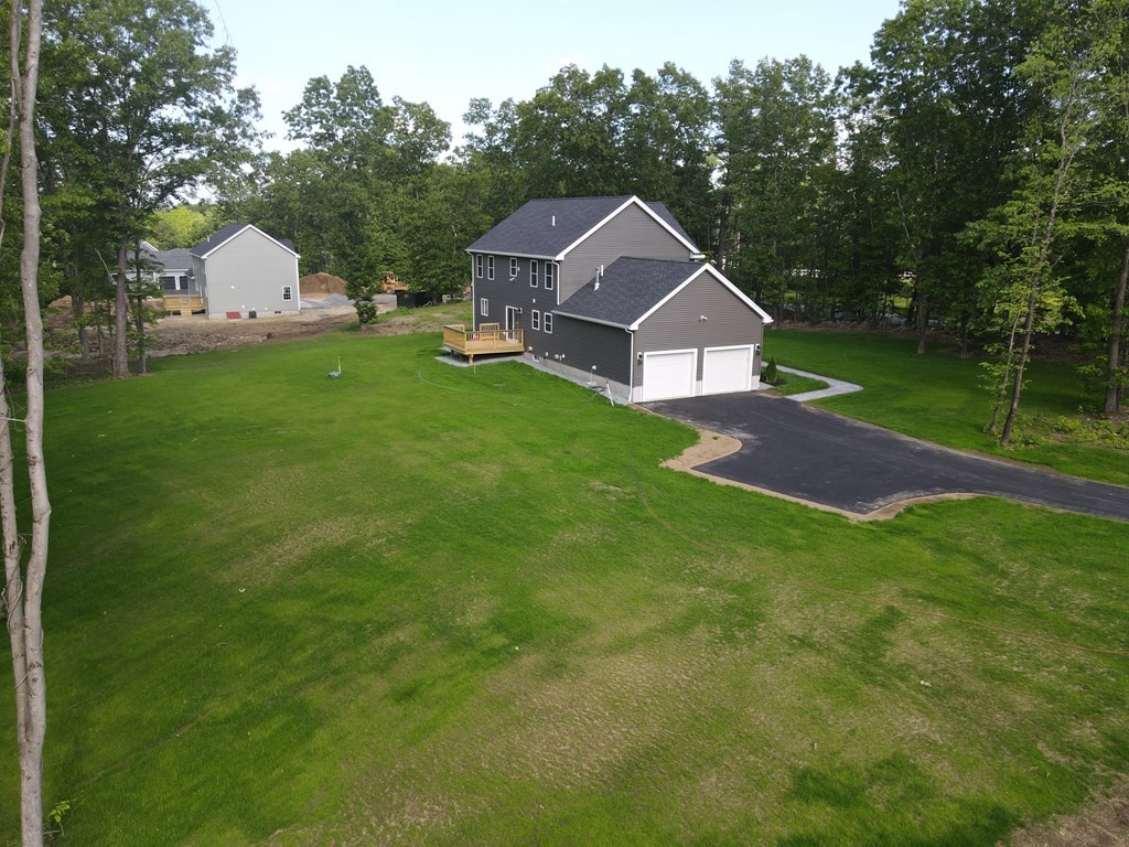 492 Northfield Road Lunenburg, MA 01462 - Photo 39 of 39 a front view of house with yard and green space
