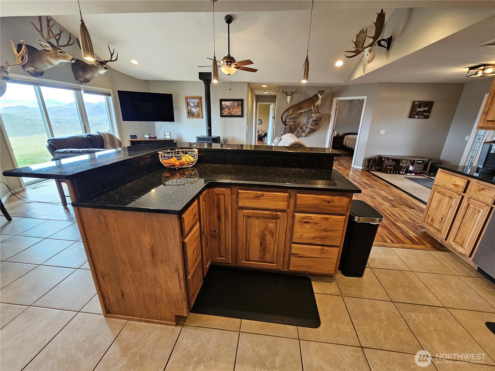711 Havillah Road Tonasket, WA 98855 - Photo 11 of 40 a kitchen with stainless steel appliances granite countertop a sink and a stove