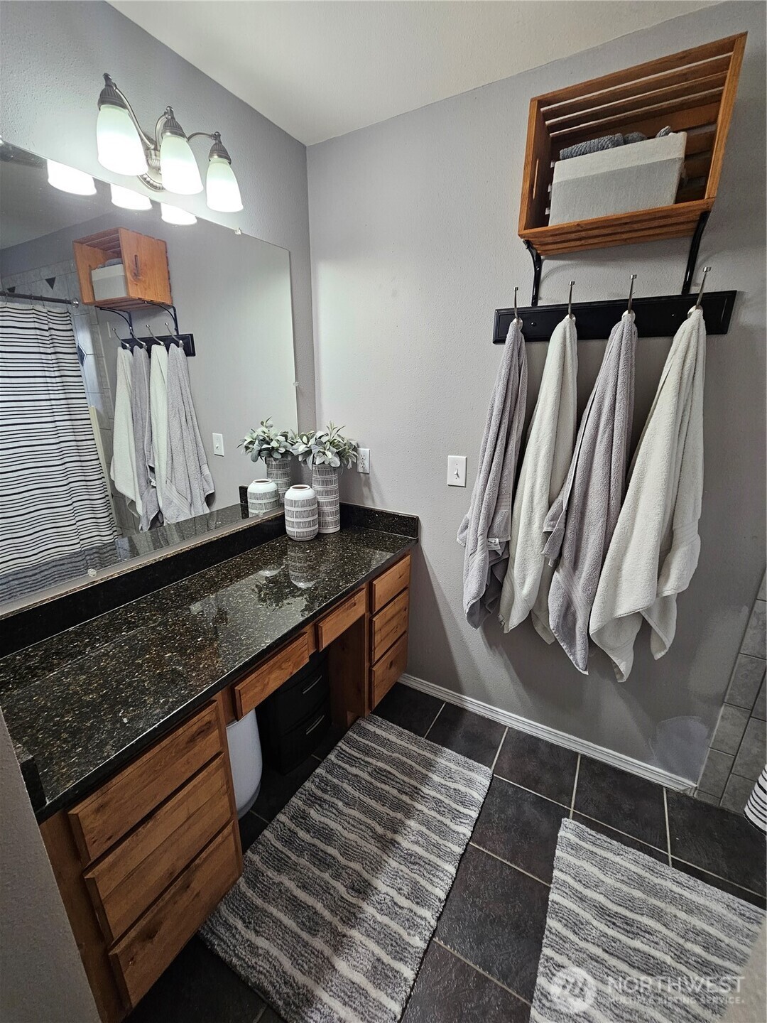 711 Havillah Road Tonasket, WA 98855 - Photo 19 of 40 a bathroom with a sink and a mirror