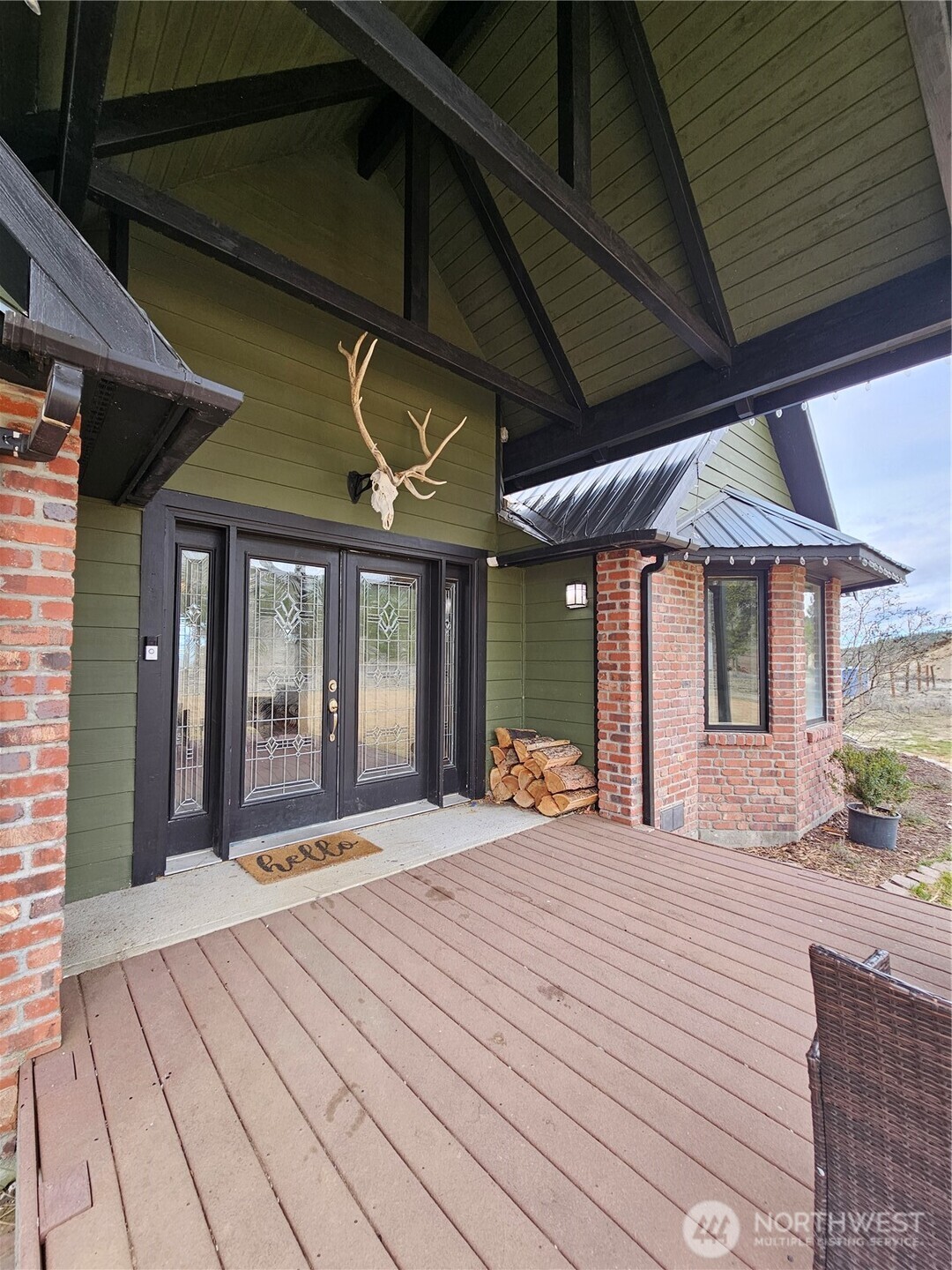 711 Havillah Road Tonasket, WA 98855 - Photo 3 of 40 a view of a house with a patio
