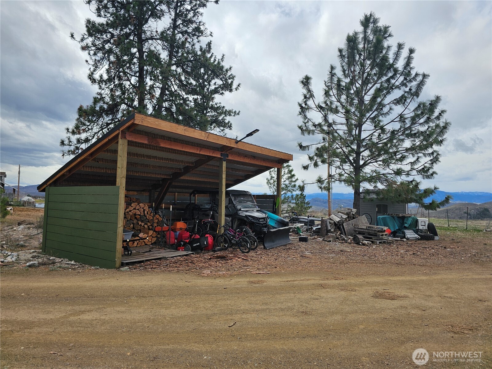 711 Havillah Road Tonasket, WA 98855 - Photo 40 of 40 a view of the house with wooden fence
