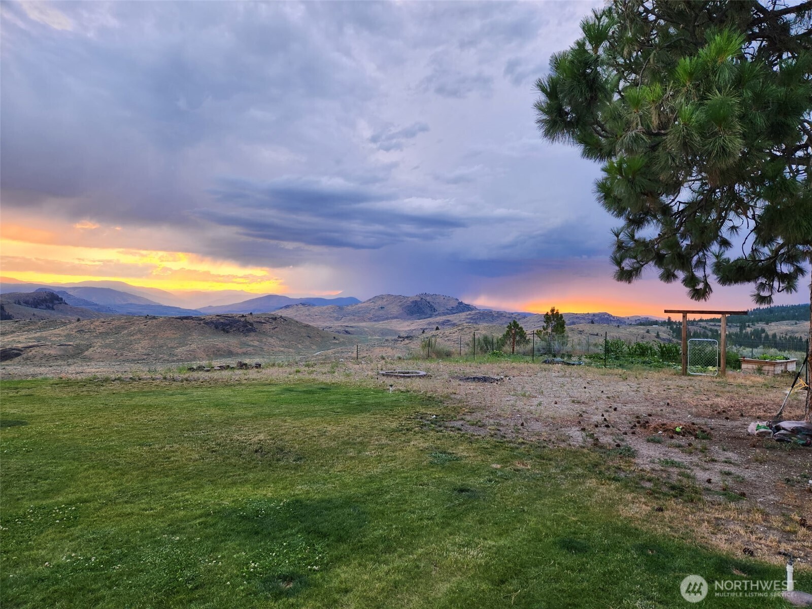 711 Havillah Road Tonasket, WA 98855 - Photo 5 of 40 a view of an outdoor space and mountain view in back